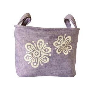 Lavender cloth basket with floral accents